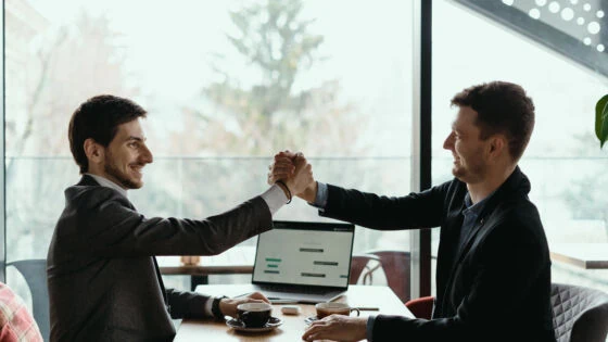 Two Business Men Celebrating A Deal