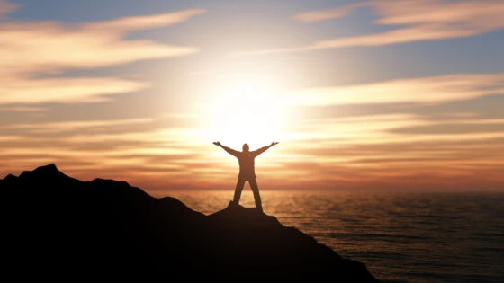 3d Silhouette Of A Man With Arms Raised Against A Sunset Ocean L